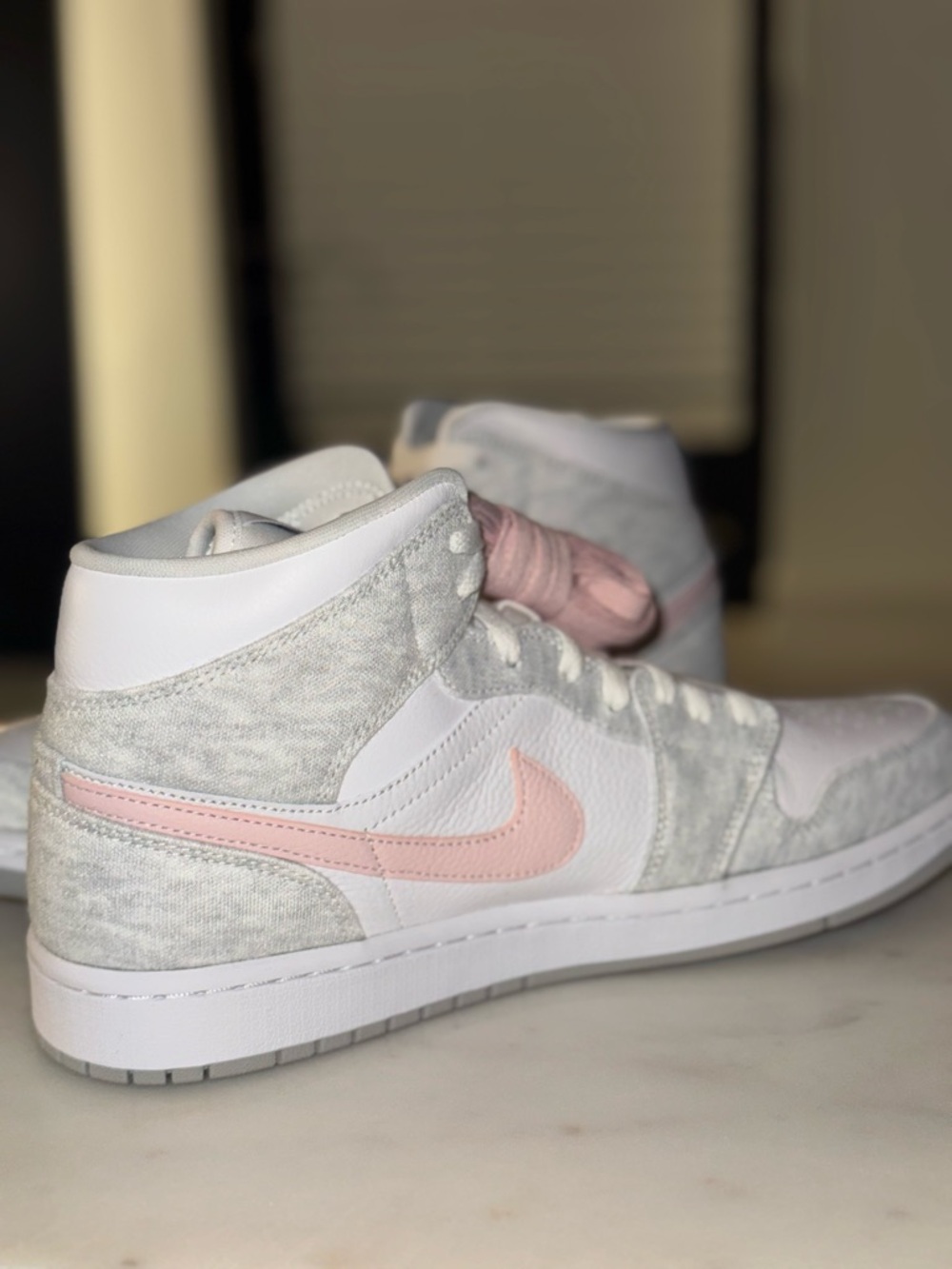 Jordan White Low-Top Sneaker with Light Pink Accents